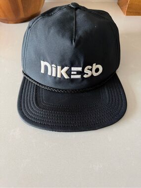 Nike SB Black Snapback Hat with White Logo